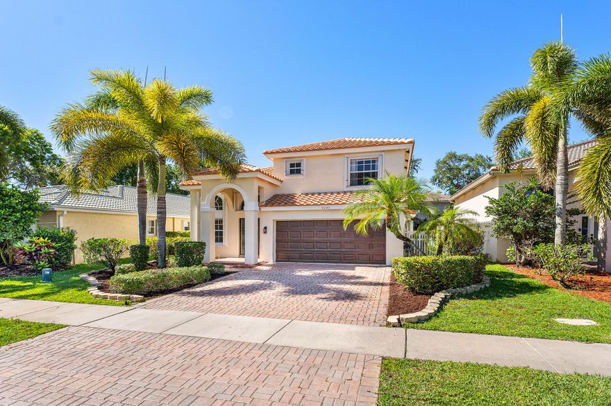This beautiful 4-bedroom, 2.5-bath home is in the highly sought-after gated community of The Isles at Wellington. Situated at the end of a quiet street, this two-story residence offers over 2,150 sq. ft. of comfortable living space, abundant natural light, renovated kitchen with quartz countertops, 2018 roof, hurricane protection, and a new water heater. The fully fenced backyard and paved terrace are perfect for relaxing, outdoor dining, or hosting friends. Isles residents enjoy resort-style amenities including a clubhouse, heated pool, fitness center, tennis, basketball and pickleball courts, turf playgrounds, putting greens and scenic walking paths. Close proximity to top-rated schools, dining, & world-renowned equestrian venues. LOW HOA covers high-speed internet, cable & ADT security.