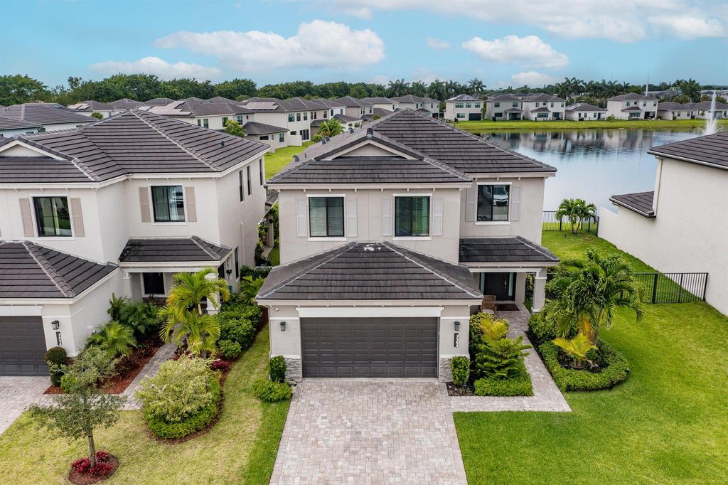 Photo of 7504 Moonrise Drive, Lake Worth, FL 33467 (MLS # R10896739)