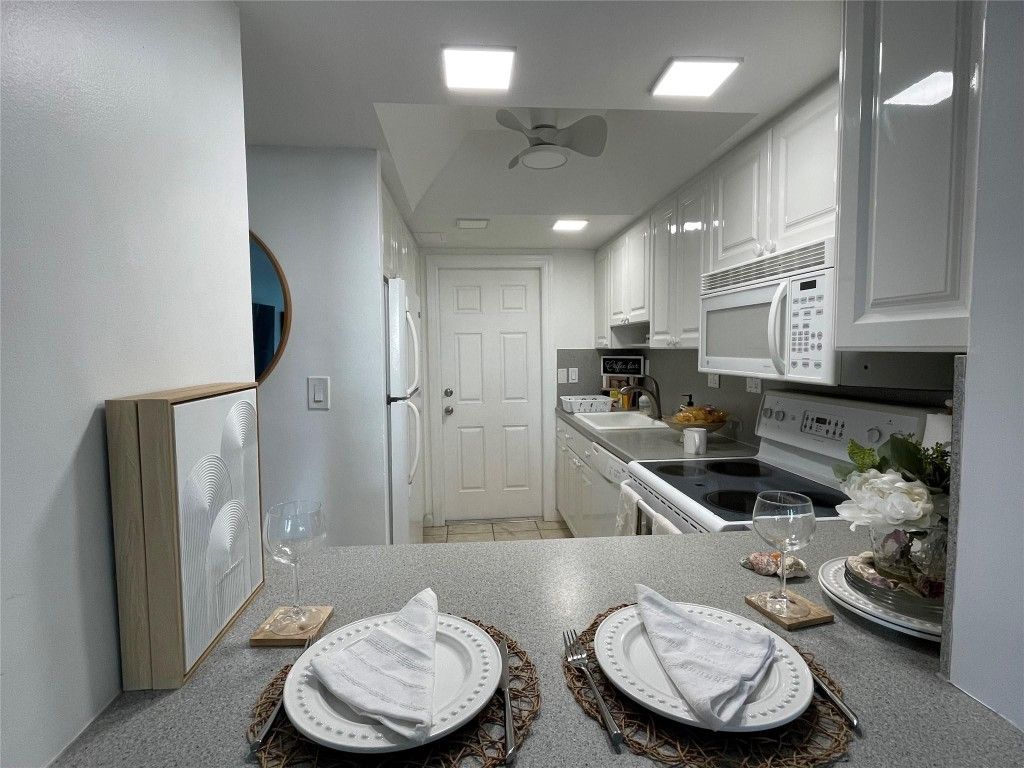 Photo of 333 NE 21st Avenue #208, Deerfield Beach, FL 33441 (MLS # F10477551)