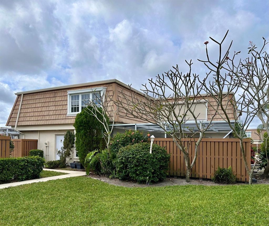 Photo of 11551 Winchester Drive, Palm Beach Gardens, FL 33410 (MLS # R10964942)