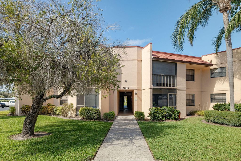 Photo of 2083 NE Collins Circle #8-100, Jensen Beach, FL 34957 (MLS # R11063377)