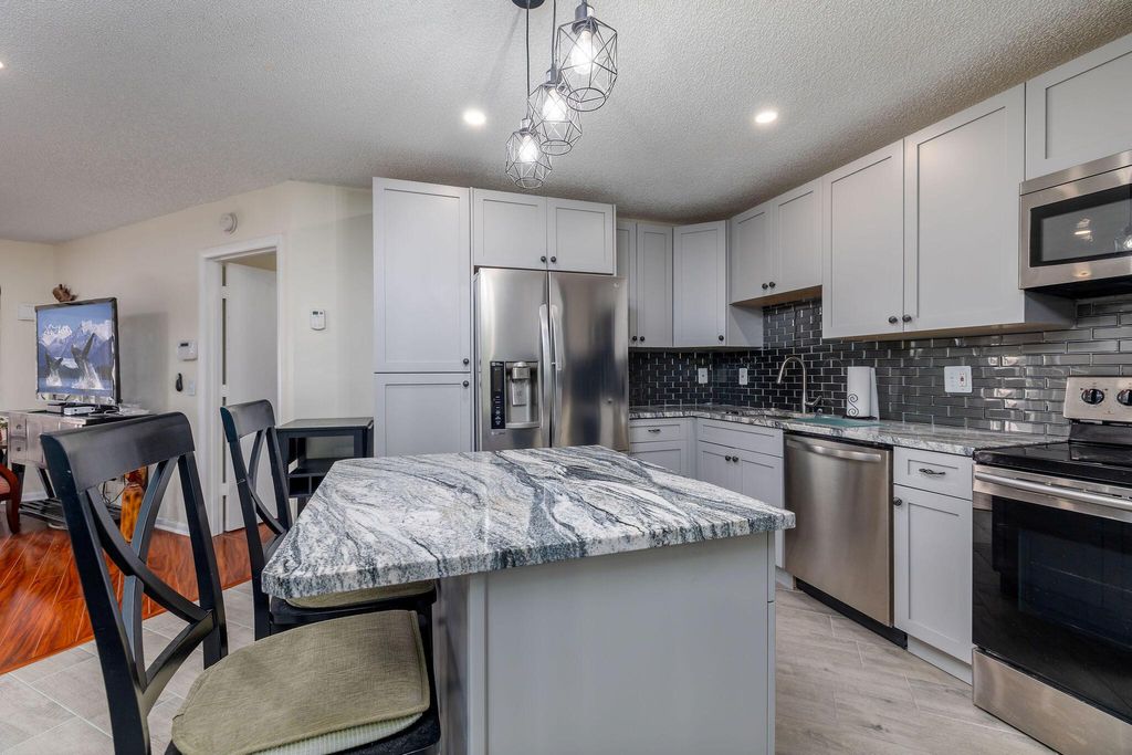 Photo of 2083 NE Collins Circle #8-100, Jensen Beach, FL 34957 (MLS # R11063377)