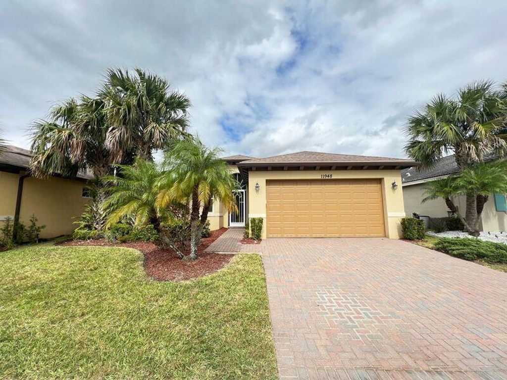 Photo of 11948 SW Crestwood Circle, Port Saint Lucie, FL 34987 (MLS # B26016938)