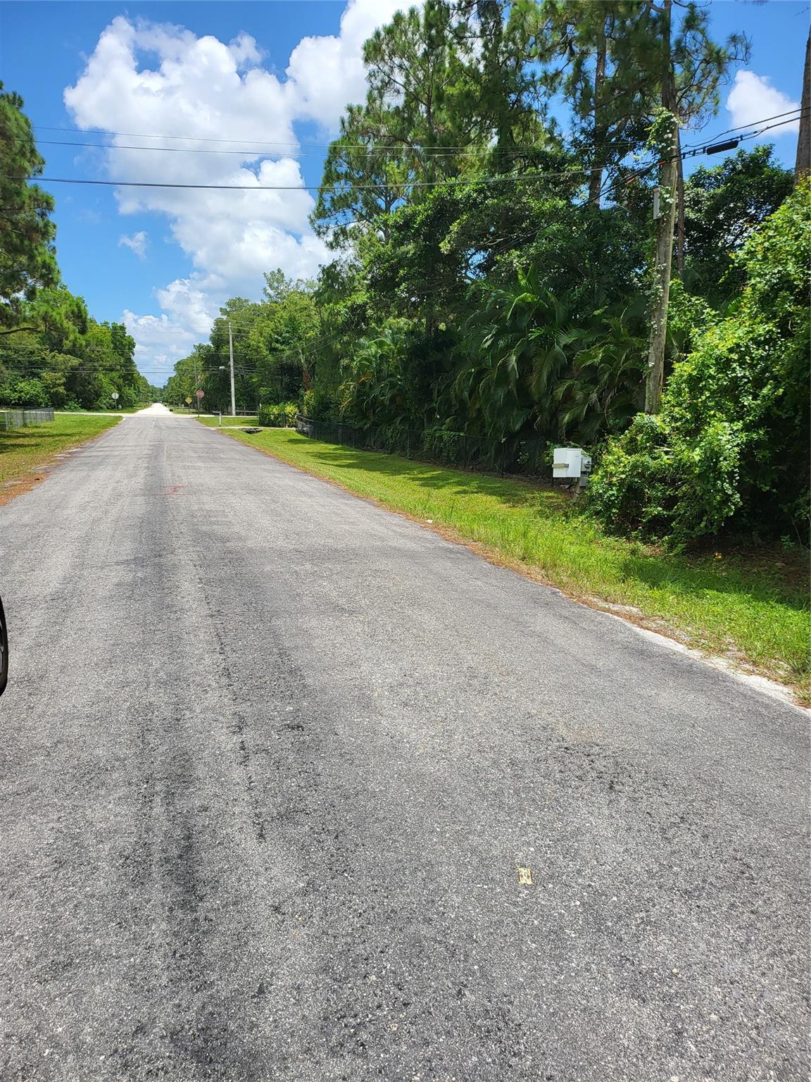 Located in The Acreage, this lot is perfect for those families looking to get away and build their dream home! Located on 68th Street North, this is the remaining vacant lot available. Off Seminole Pratt Whitney Road to 68th Street North, West to the lot on the left side. Make us an offer today!
Note: Exact square footage and acre size is from Tax Roll and is being verified.