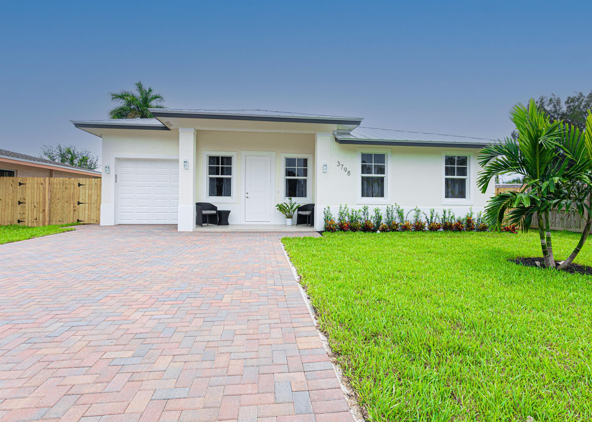 This newly built 4-bedroom, 3-bathroom home offers 1,671 sq ft two master suites with private en-suite bathrooms, this layout is ideal for multi-generational living or hosting guests with ease. Clean lines and durable finishes, the home features 9.4 ft ceilings, 8 ft doors, and ceramic tile throughout for a bright, open feel. The kitchen is equipped with 42-inch cabinets, quartz countertops, stainless steel appliances, and a center island perfect for both daily use and entertaining.Built for low maintenance and peace of mind, the property includes a metal roof, impact-resistant windows, and durable materials throughout. Additional highlights include a 1-car garage and open-concept living areas that flow seamlessly.Located in a prime Palm Springs location,