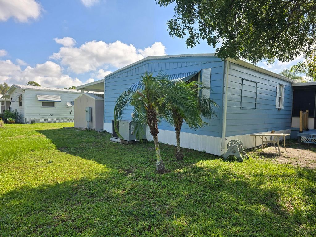 Photo of 7 Madrid Lane, Port Saint Lucie, FL 34952 (MLS # B26028857)