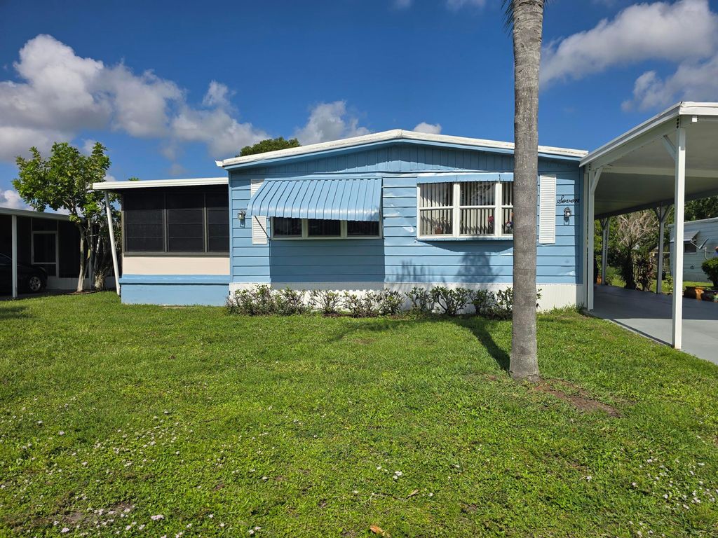 Photo of 7 Madrid Lane, Port Saint Lucie, FL 34952 (MLS # B26028857)