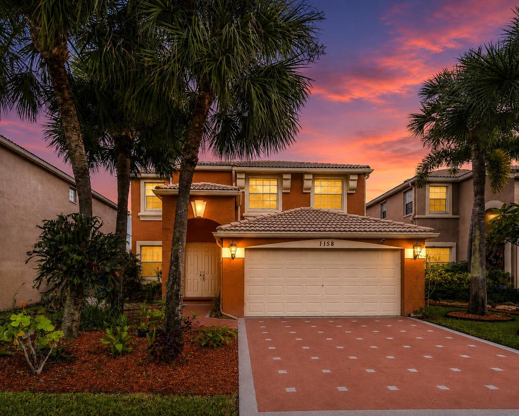 Photo of 1158 OAKWATER Drive, Royal Palm Beach, FL 33411 (MLS # B26068067)