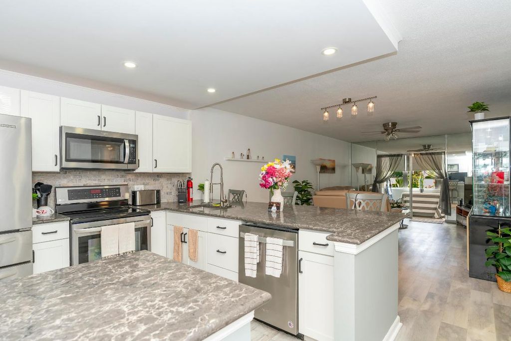 Photo of 2600 NE 1st Lane #104, Boynton Beach, FL 33435 (MLS # R11154885)