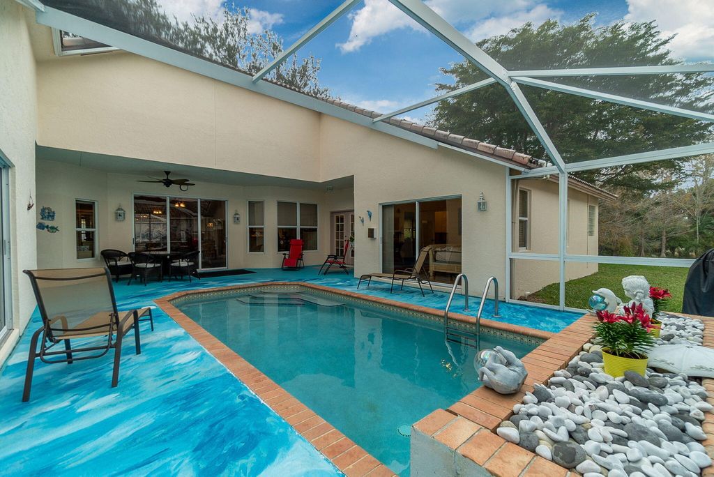 Photo of 2700 Pointe Circle, Greenacres, FL 33413 (MLS # R10952711)
