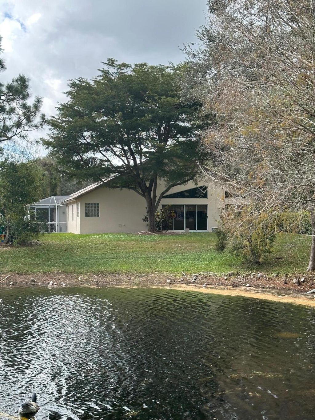 Photo of 2700 Pointe Circle, Greenacres, FL 33413 (MLS # R10952711)