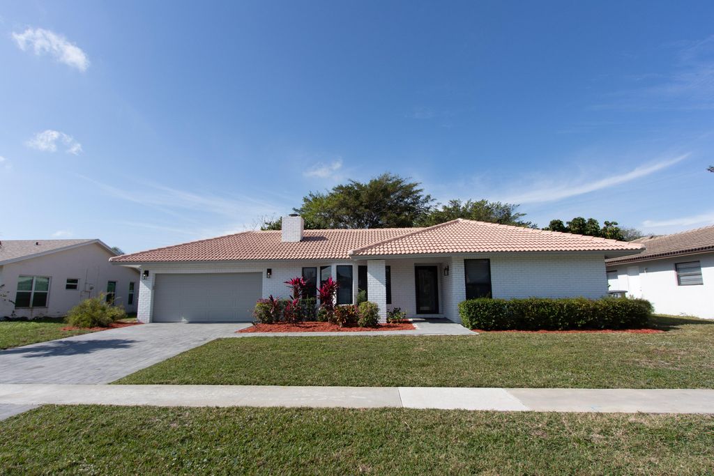 Photo of 21553 Chipmunk Lane, Boca Raton, FL 33428 (MLS # R10951409)