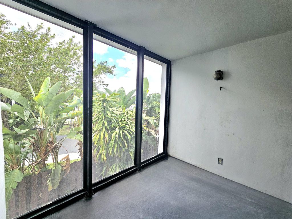 Photo of 213 Lake Pointe Drive #212, Oakland Park, FL 33309 (MLS # B26020265)