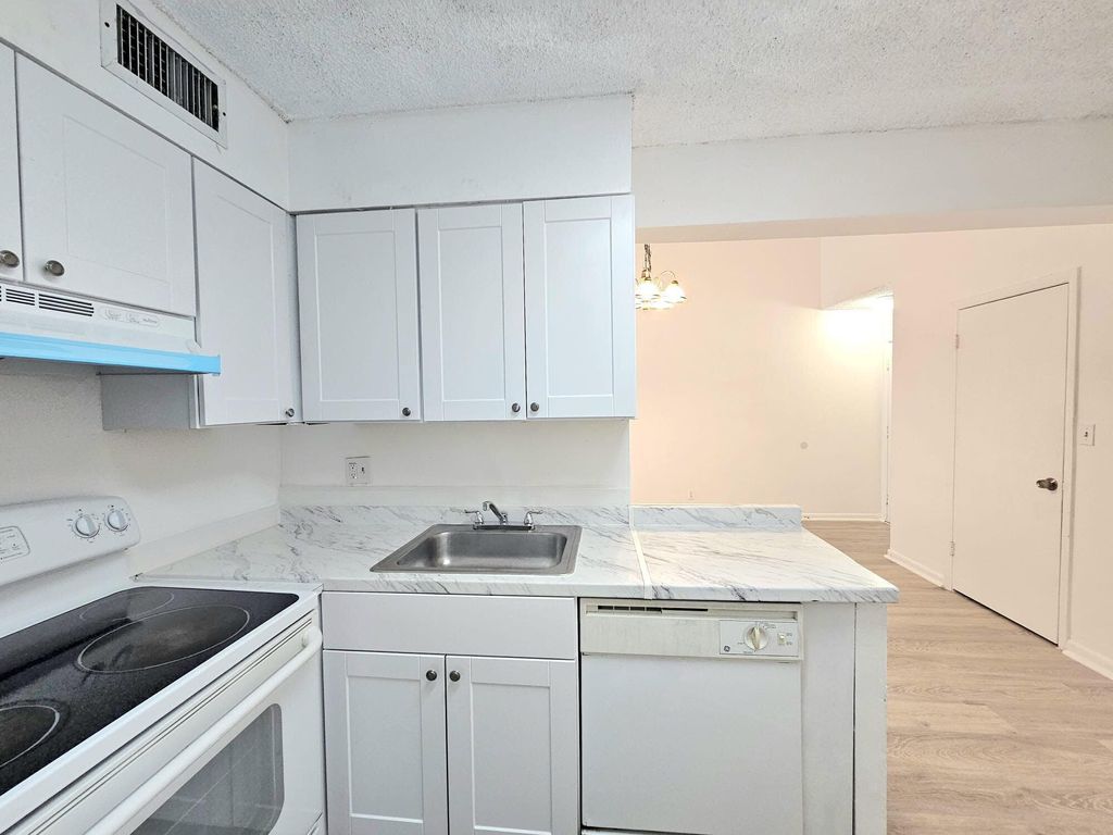 Photo of 213 Lake Pointe Drive #212, Oakland Park, FL 33309 (MLS # B26020265)