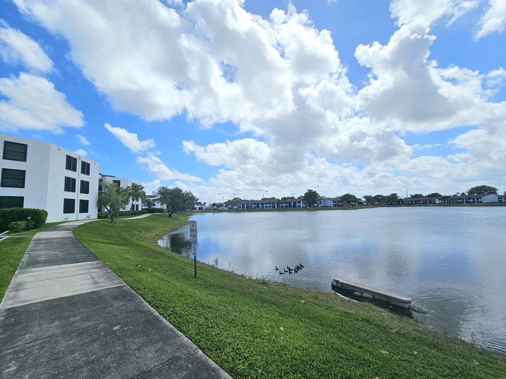 Photo of 213 Lake Pointe Drive #212, Oakland Park, FL 33309 (MLS # B26020265)