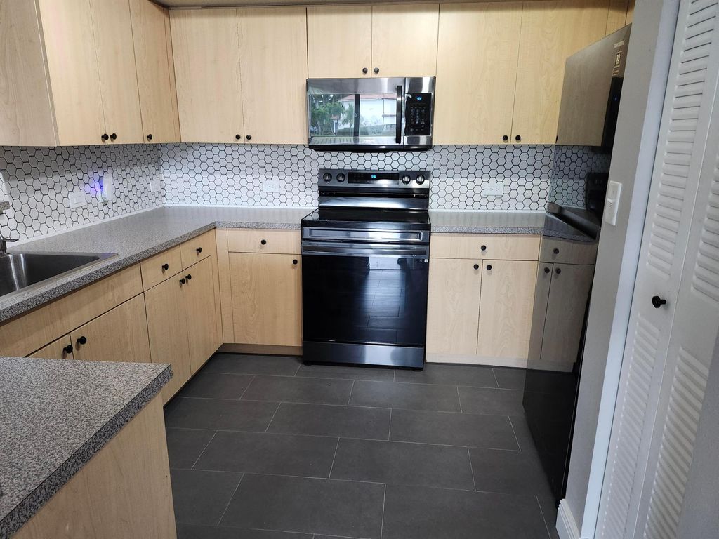 Photo of 702 Villa Circle, Boynton Beach, FL 33435 (MLS # R11055486)