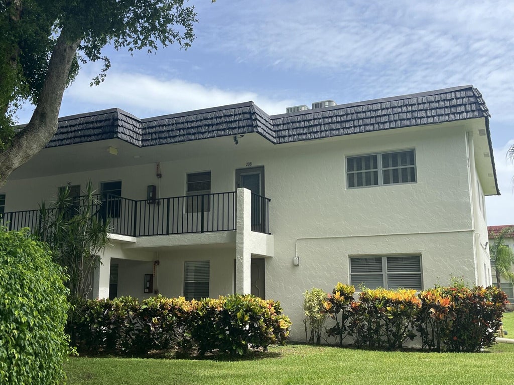 Photo of 23 Abbey Lane #208, Delray Beach, FL 33446 (MLS # B26033991)