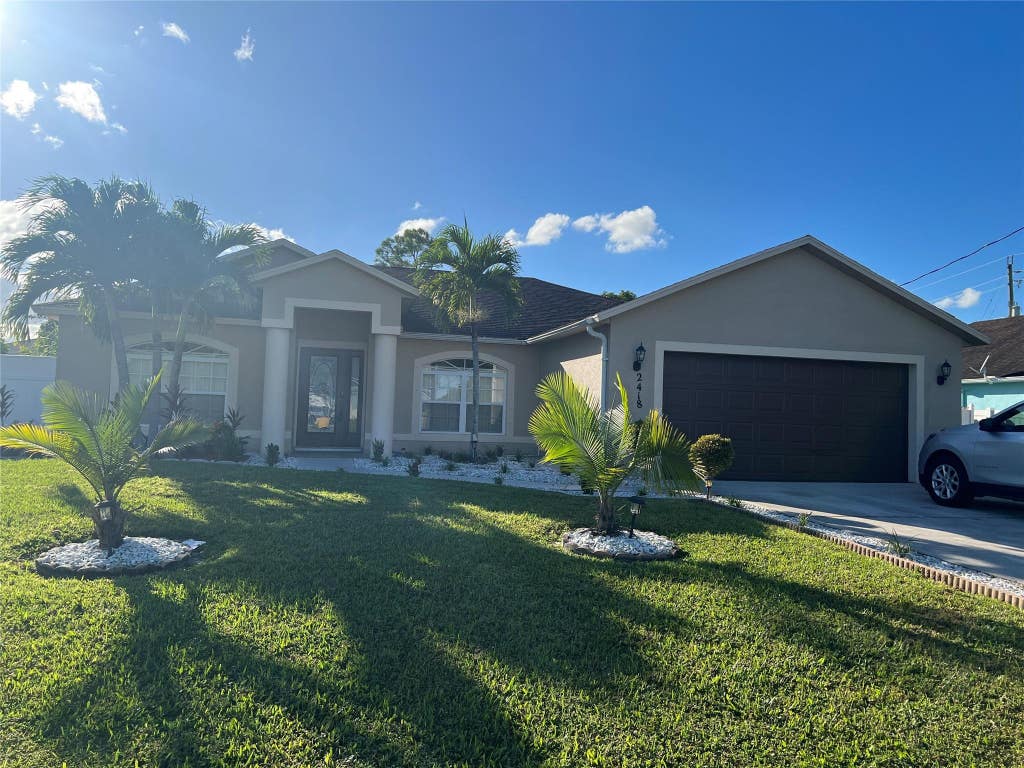Photo of 2418 SW Brescia Street, Port Saint Lucie, FL 34953 (MLS # F10531862)