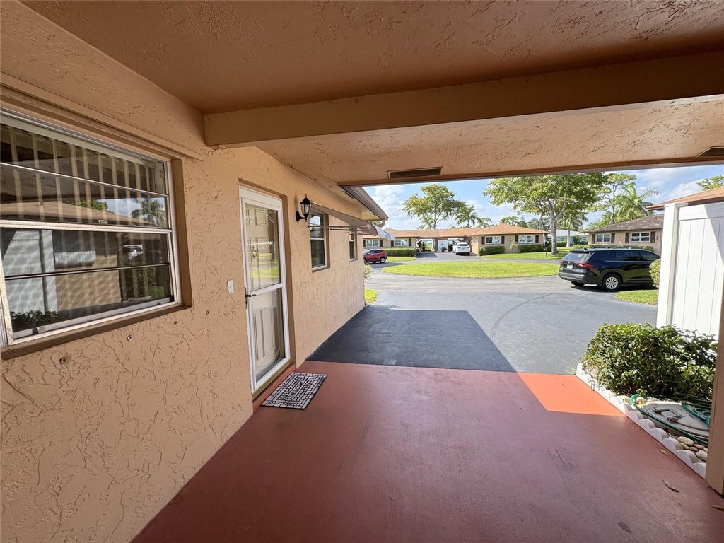 Photo of 710 Whippoorwill Lane #710, Delray Beach, FL 33445 (MLS # F10500547)