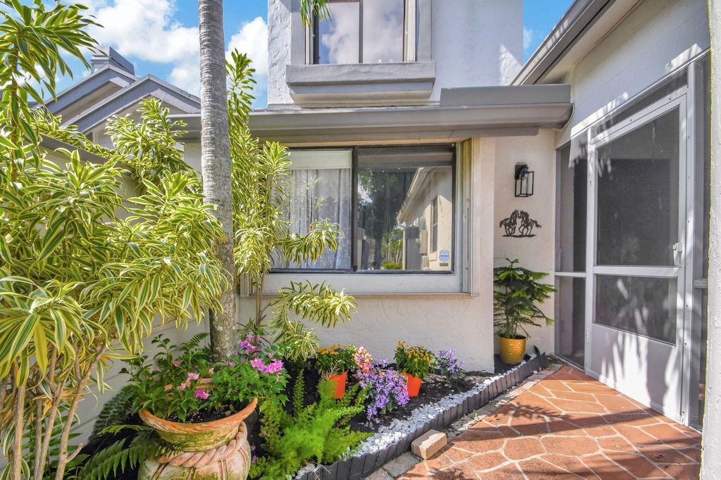 Photo of 905 Landings Boulevard, Greenacres, FL 33413 (MLS # R10986365)