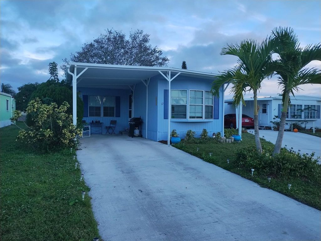 Photo of 17 Don Quixote Lane, Port Saint Lucie, FL 34952 (MLS # R10947457)