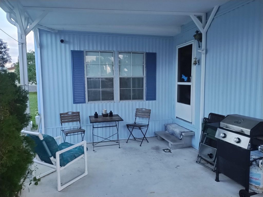 Photo of 17 Don Quixote Lane, Port Saint Lucie, FL 34952 (MLS # R10947457)