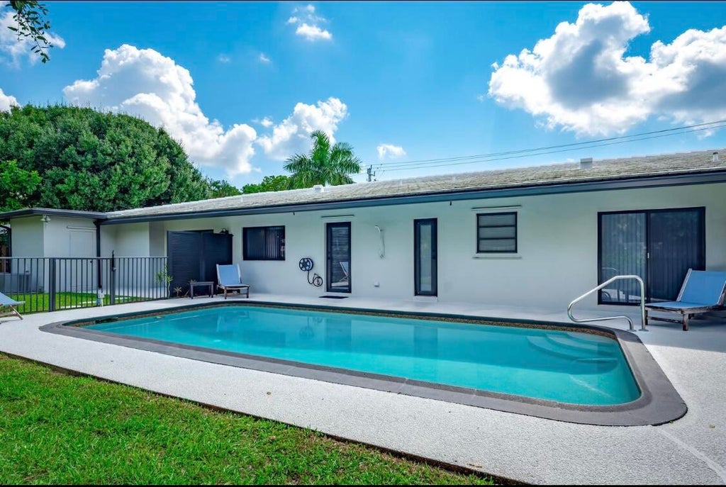 Photo of 5903 NE 7th Avenue, Boca Raton, FL 33487 (MLS # R11020649)