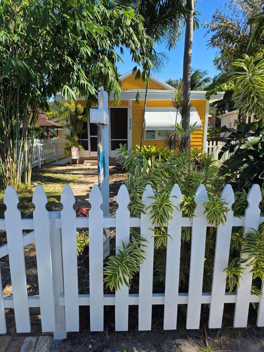 Charming 2 bedroom 1 bath Key West cottage beautifully situated, within  2 miles of our gorgeous sandy beaches, the iconic Bennys on the Beach, our oceafront Board Walk, the LWB pier, park, amphitheater, 1 mile to our Municipal 18 hole championship golf course, easy access boat dock, close walking distance to 1926 Playhouse, fine establishments for suds n culinary delights, & Publix! From the minute you walk into this home you feel the warmth and charm it exudes, full of light, original built in storage, screen porch, concrete patio, range & dishwasher 2025, newer fridge, AC & water heater 2020 roof 2014, fence 2025, a Rubbermaid shed in the back and yes room for a pool! This original cottage is in very clean, solid condition, beautiful oak hardwood floors, ready for your personal touche