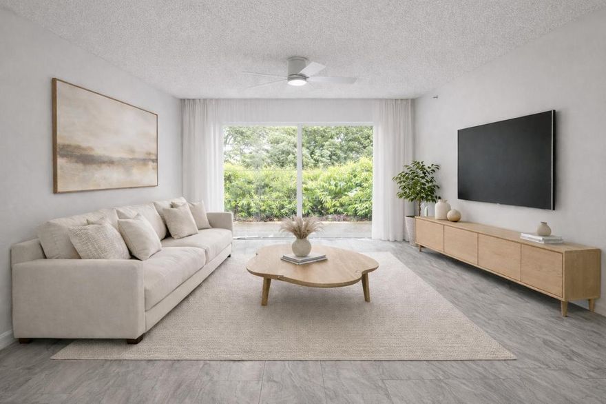 Spacious first-floor 3BR residence freshly painted and move-in ready. Bathrooms feature new vanities, toilets, lighting, and refreshed tubs. Kitchen offers clean updated finishes with newer appliances, including a brand-new microwave. In-unit washer and dryer. A/C replaced in 2021, new roof, and no current assessments.

Located in a well-maintained all-ages community with lake, pool, fitness center, tennis courts, playground, and ample guest parking. Competitively priced below recent renovated sales. Easy to show.