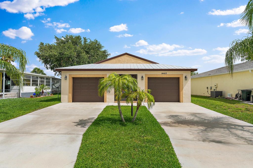 Photo of 14412 Cancun Avenue, Fort Pierce, FL 34951 (MLS # R10906638)