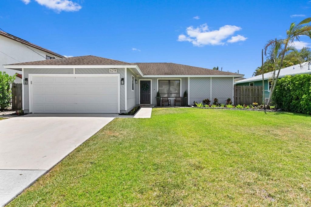 Photo of 6214 Garrett Street, Jupiter, FL 33458 (MLS # R11086639)