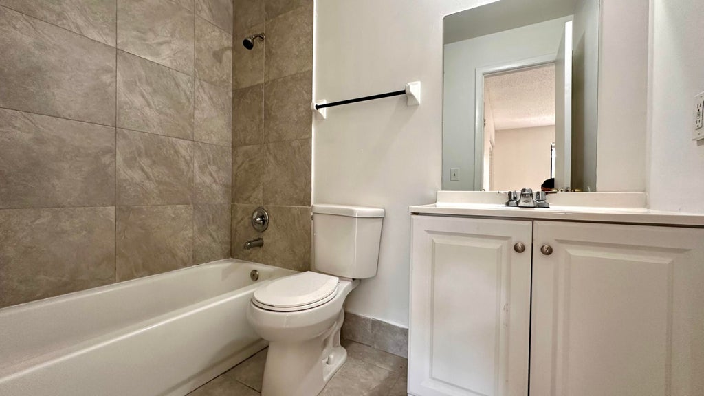 Photo of 3096 Collin Drive #C, West Palm Beach, FL 33406 (MLS # B26092551)