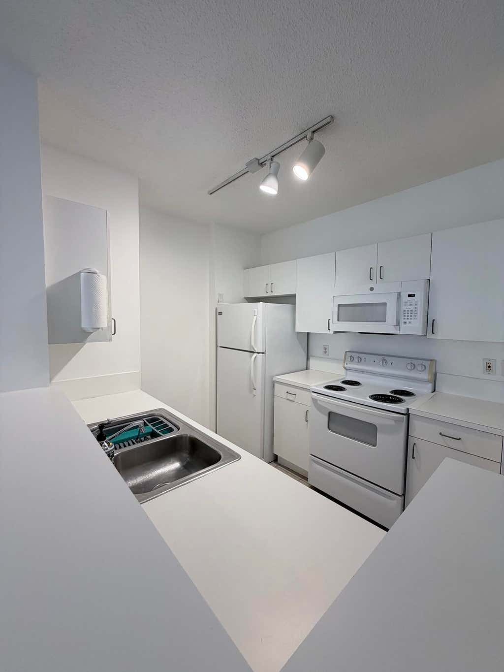 Photo of 630 S SAPODILLA Avenue #323, West Palm Beach, FL 33401 (MLS # B26061852)