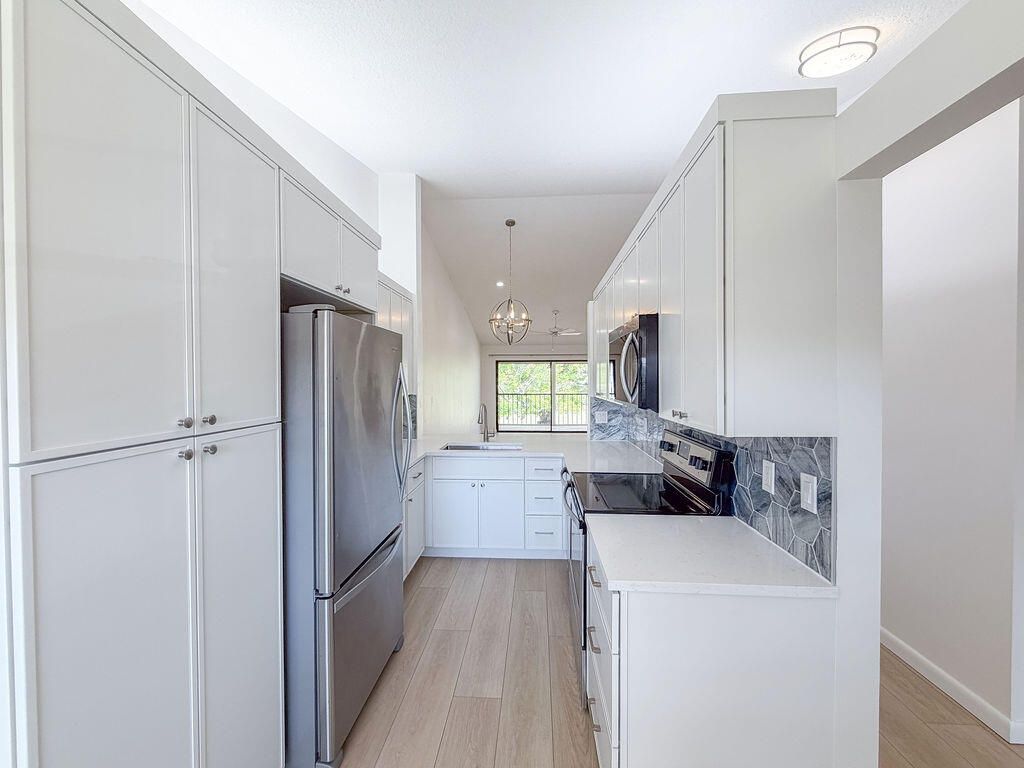 Photo of 602 Pine Crest Circle #B, Jupiter, FL 33458 (MLS # R11163665)