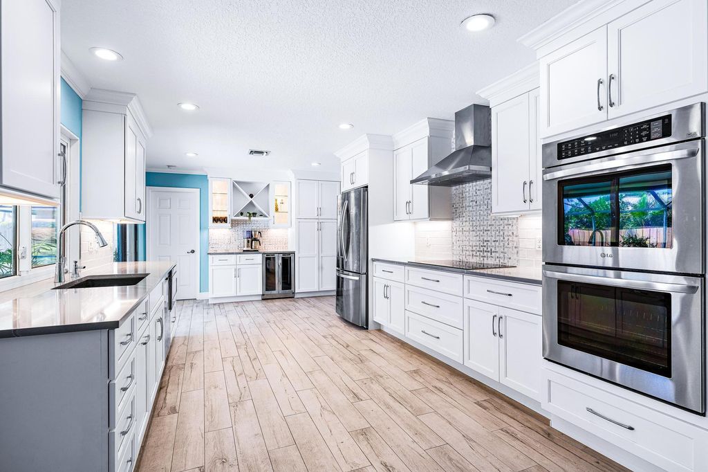 Photo of 89 Hickory Hill Road, Tequesta, FL 33469 (MLS # R10987425)