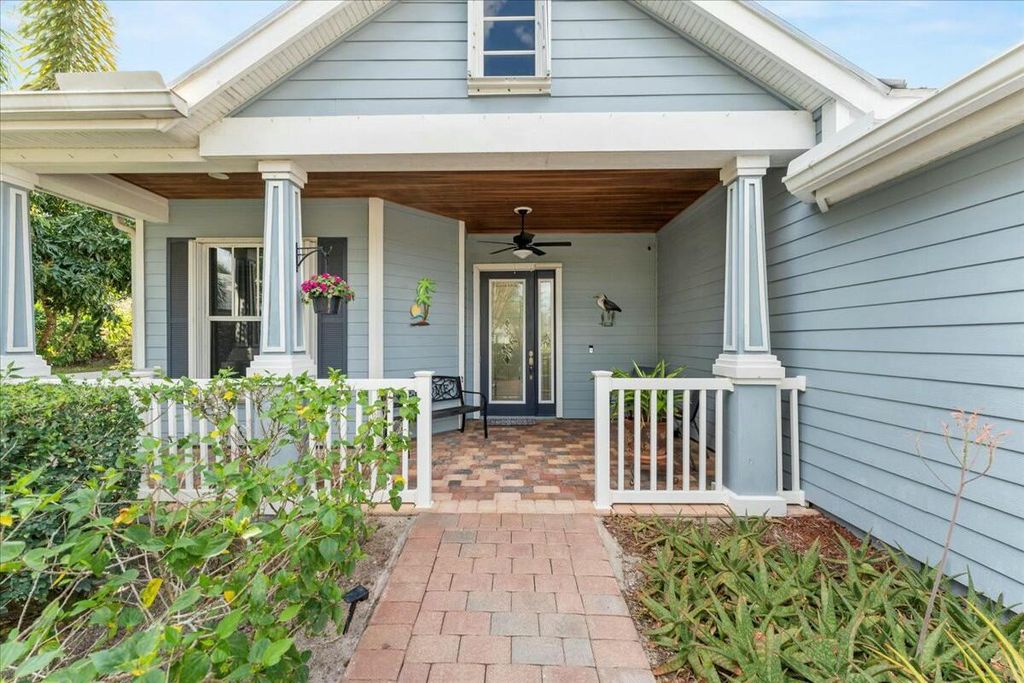 Photo of 402 NE Ginger Lily Place, Port Saint Lucie, FL 34983 (MLS # R11064841)