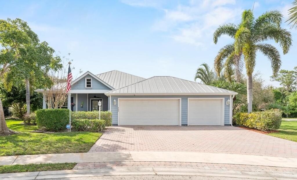 Photo of 402 NE Ginger Lily Place, Port Saint Lucie, FL 34983 (MLS # R11064841)