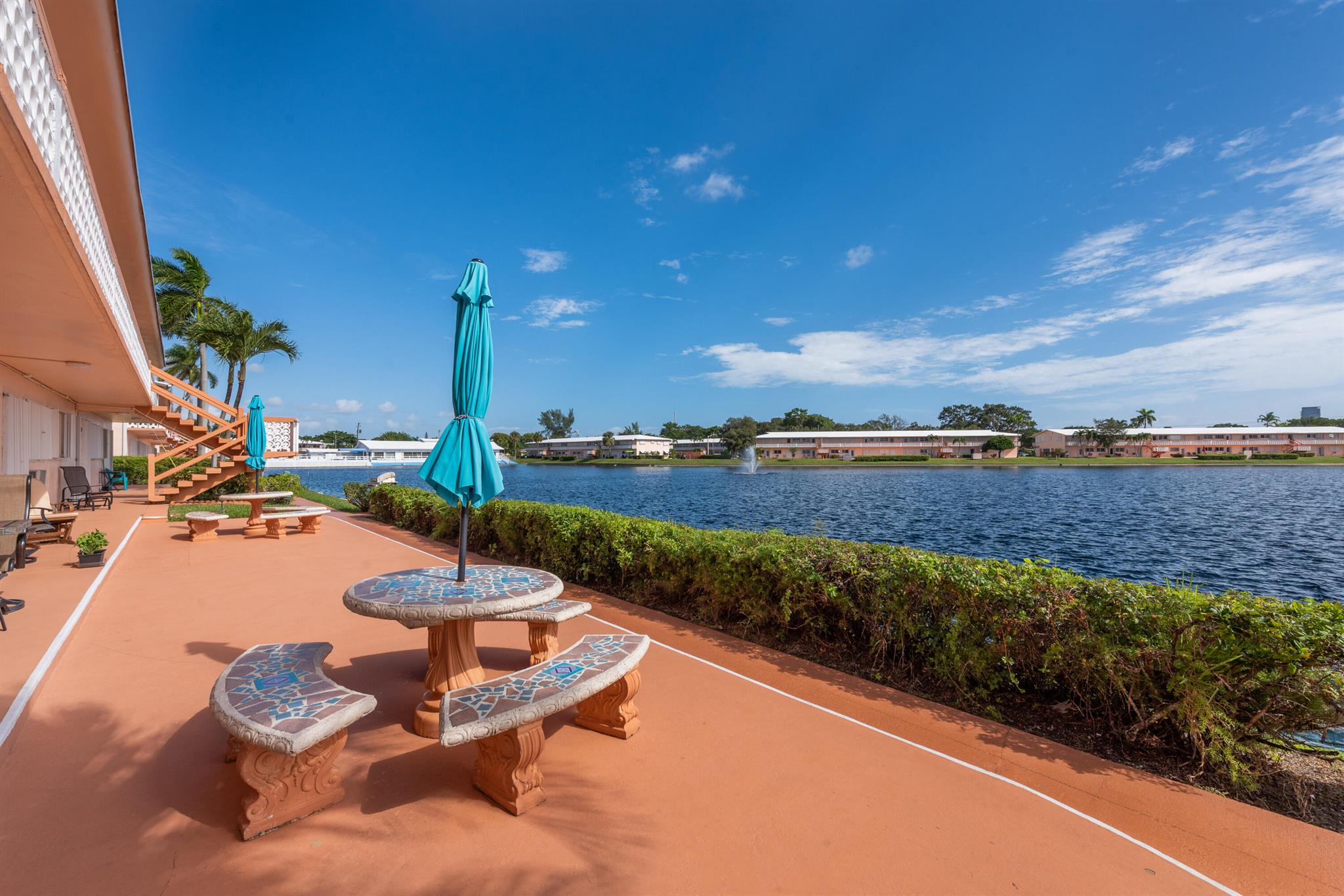 Beautifully kept unit with gorgeous lake views, wake up with the sunshine and enjoy your morning coffee on the patio. Murphy bed for guests in your living room. Available fully furnished, just move right in and winter in Florida. Lovely clubhouse with pool overlooking the huge lake. Secure with accordion shutters.Unfortunately can only close after March 15th per coop board.