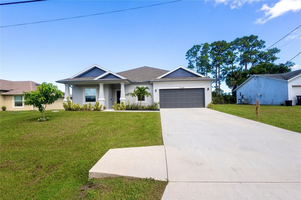 Photo of 2149 SW Susset Lane, Port Saint Lucie, FL 32935 (MLS # F10529227)