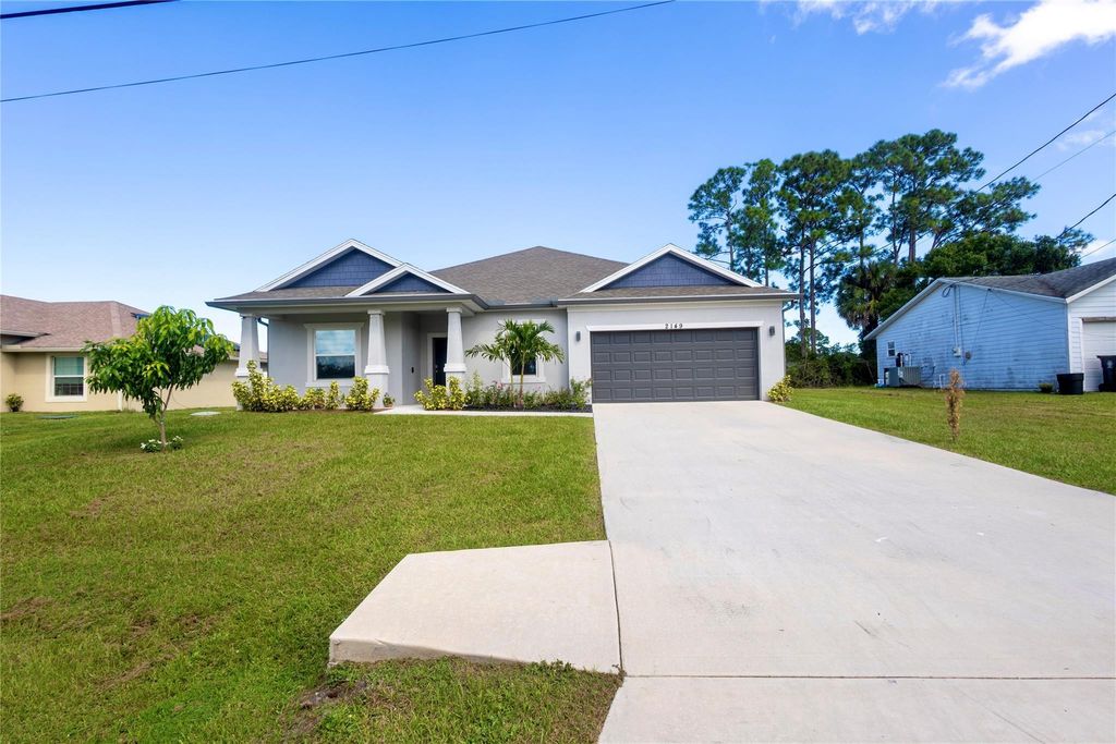 Photo of 2149 SW Susset Lane, Port Saint Lucie, FL 32935 (MLS # F10529227)