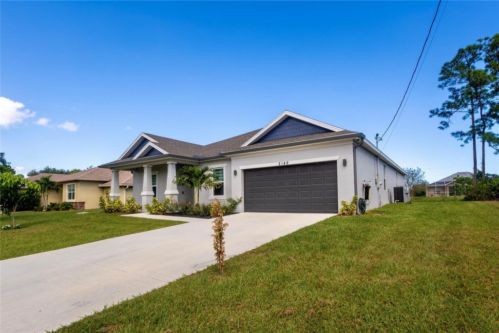 Photo of 2149 SW Susset Lane, Port Saint Lucie, FL 32935 (MLS # F10529227)