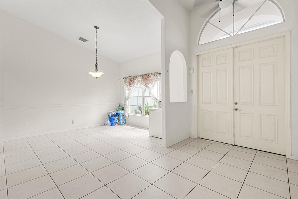 Photo of 1818 SW Day Street, Port Saint Lucie, FL 34953 (MLS # R11000183)
