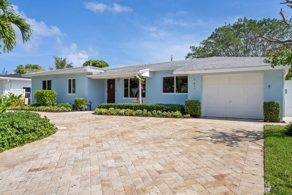 Photo of 145 Vassar Drive, Lake Worth Beach, FL 33460 (MLS # B26034913)