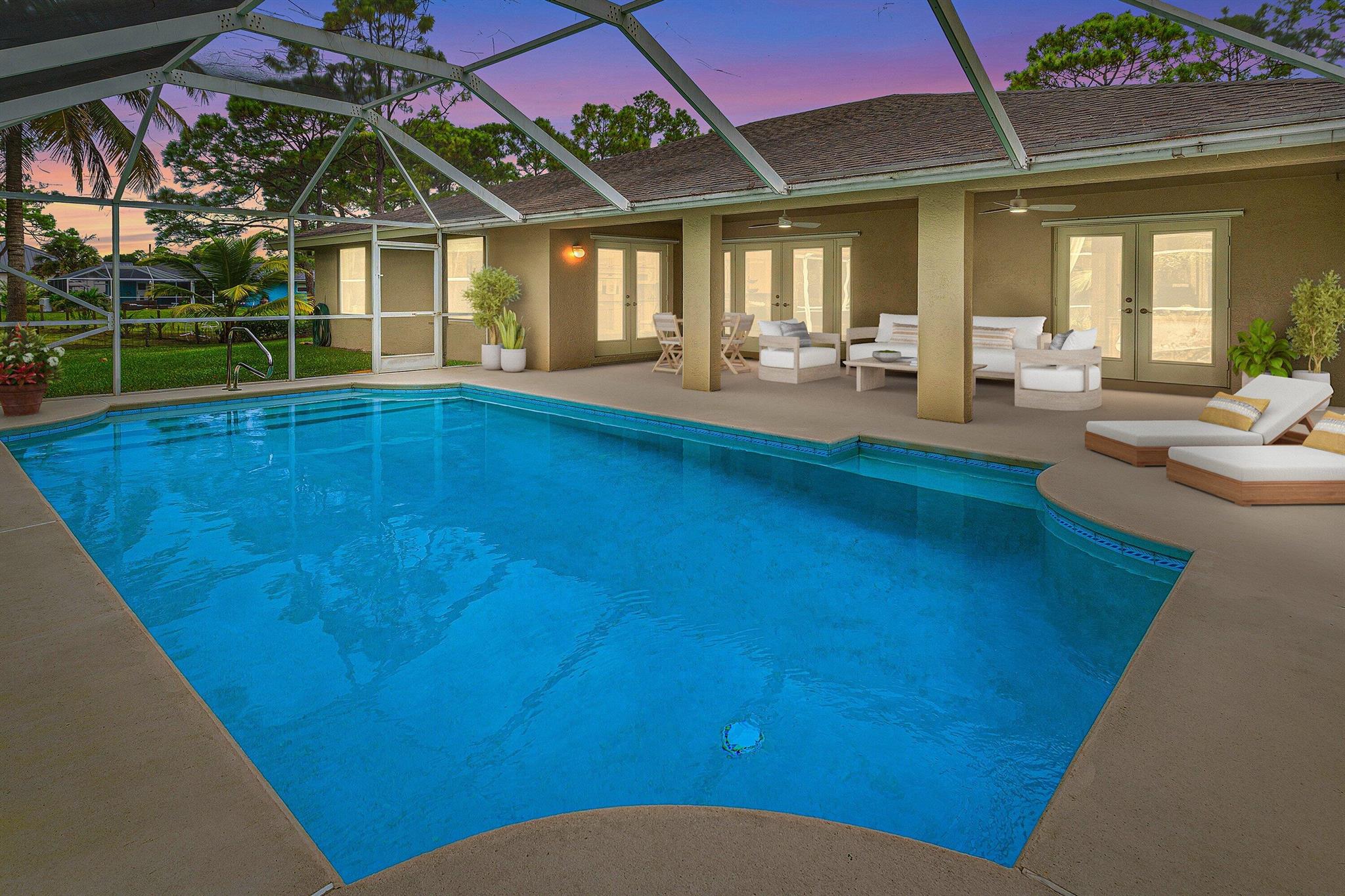 WELCOME HOME This gem is resting on a premium 1.15 acre lot and boasting 3 bedrooms, 483sqft theater/BONUS room, 2 full baths, detached 2 car garage, sparkling pool, upgrades throughout, 2018 roof, landscaping galore, superb location, quiet paved street and this beauty is very well maintained! ENTERING you will discover, a high and dry fully fenced lot, convenient double concrete driveway, koi pond and a screened in front porch that brings you inside where you are greeted by a soaring 13' ceiling, spacious foyer, great room, natural lighting and a remodeled kitchen that features; granite countertops, Whirlpool Gold appliance package, double pantries, bar and cozy 14' x 10' breakfast nook that overlooks the pool. PASSING THROUGH you will find tray ceilings, dynamite split (CLICK)