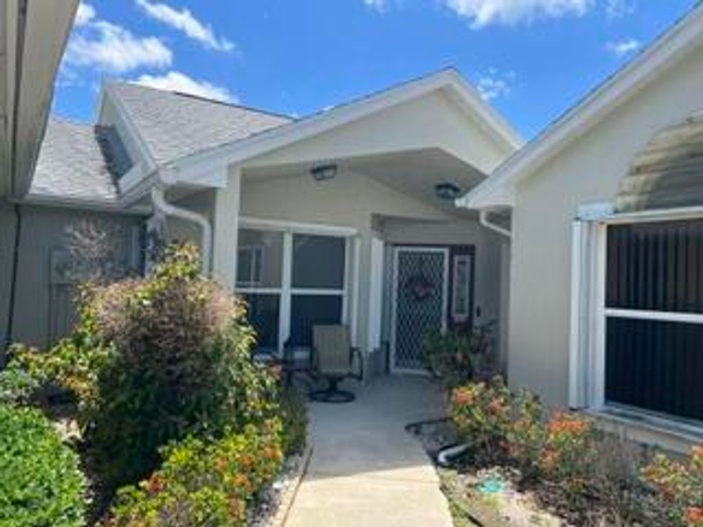 Photo of 1142 NW Lombardy Drive, Port Saint Lucie, FL 34986 (MLS # B26030451)