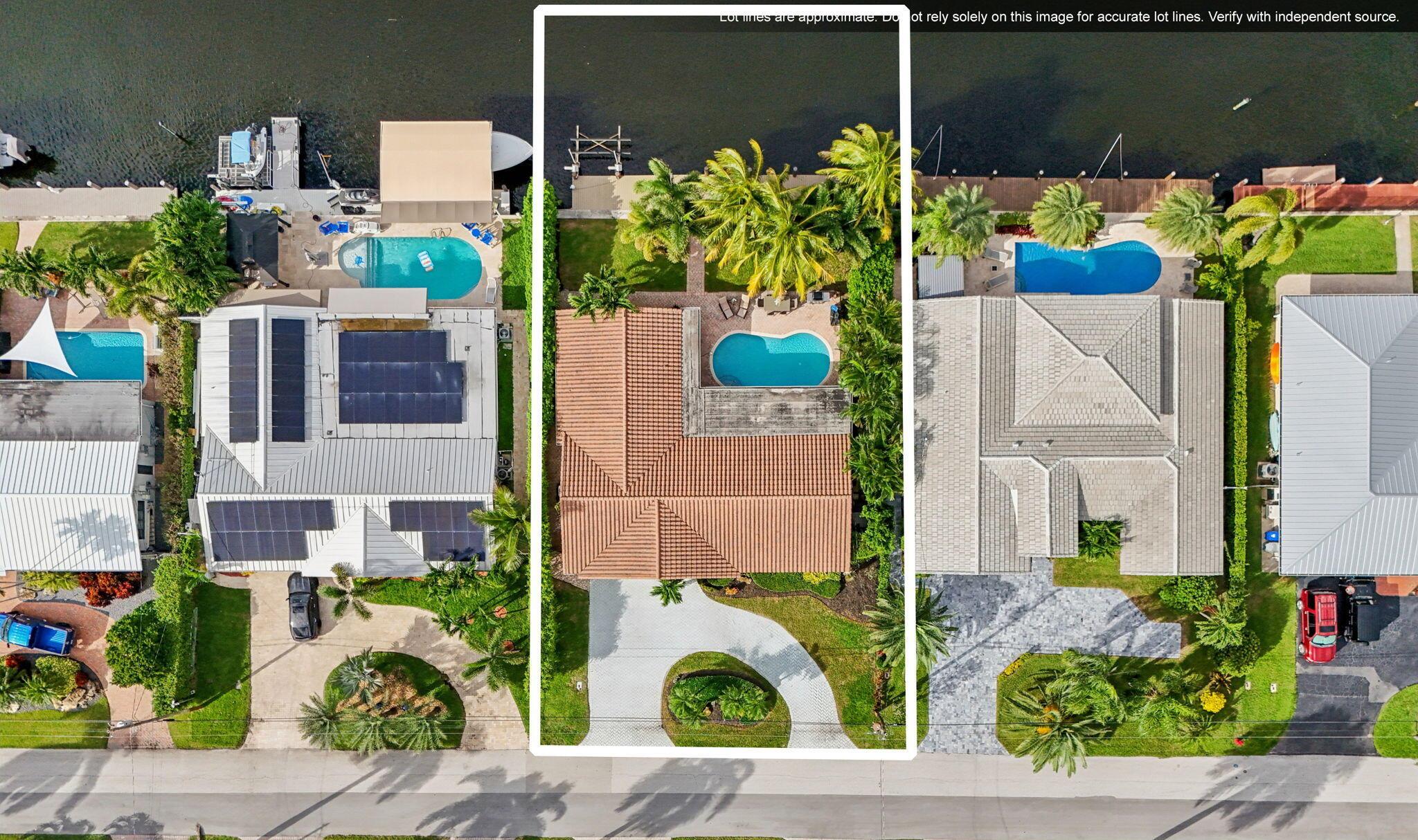 Updated deepwater home 80FT on protected canal--70 FT composite dock and 50 AMP power-wide canal! Open-concept split-bedroom layout offers additional den & formal dining(see floor plan) chef's kitchen w/custom cabinetry, gas cooktop, luxury appliances, island with wine chiller--perfect for entertaining. Elegant travertine floors, impact windows and doors, light & bright space with a coastal-modern vibe. Full sun exposed heated pool set back with lots of green space. The primary suite is spacious with custom closet & impact doors to the pool & water. 16 year old tile roof, 2020 HVAC, upgraded electric, tankless gas water heater, Nest & cameras--Many upgrades in 2021. Walk or golf cart to the beach, dining, golfing, & all entertainment! ''Seller will include golf cart w/ full price offer!''