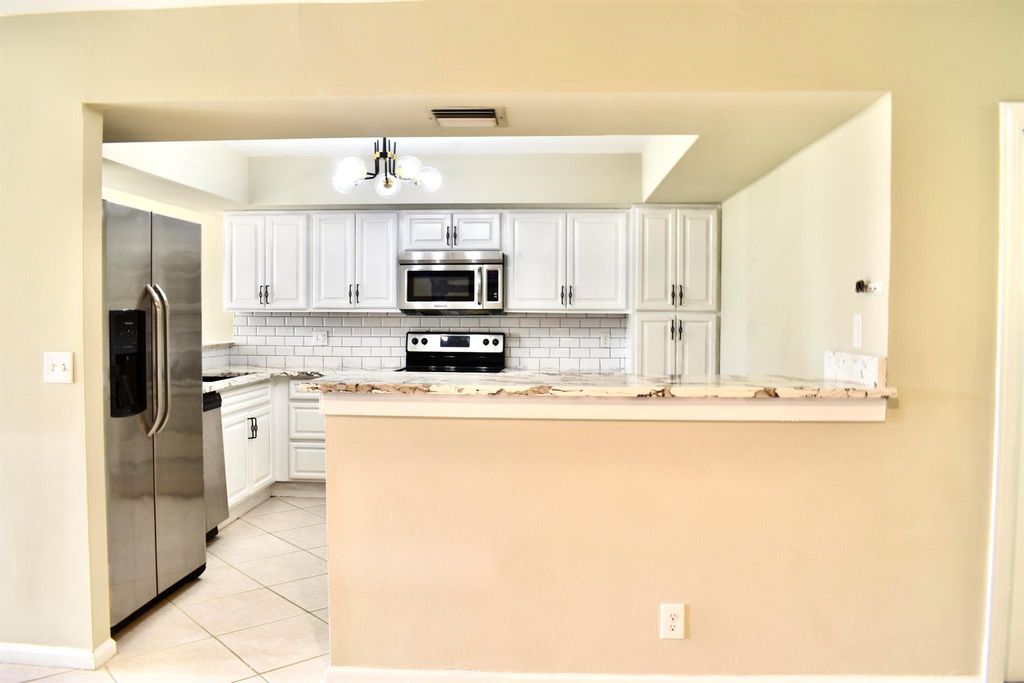 Photo of 6040 Glendale Drive, Boca Raton, FL 33433 (MLS # R11103880)