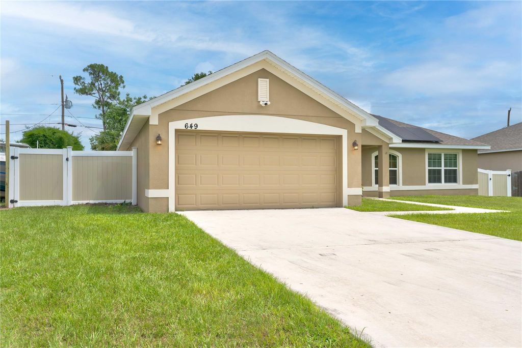 Photo of 649 SW Fair Avenue, Port Saint Lucie, FL 34953 (MLS # F10423692)