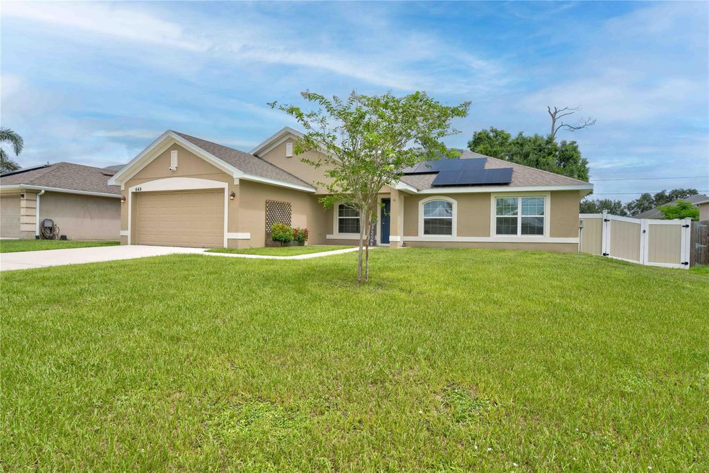Photo of 649 SW Fair Avenue, Port Saint Lucie, FL 34953 (MLS # F10423692)