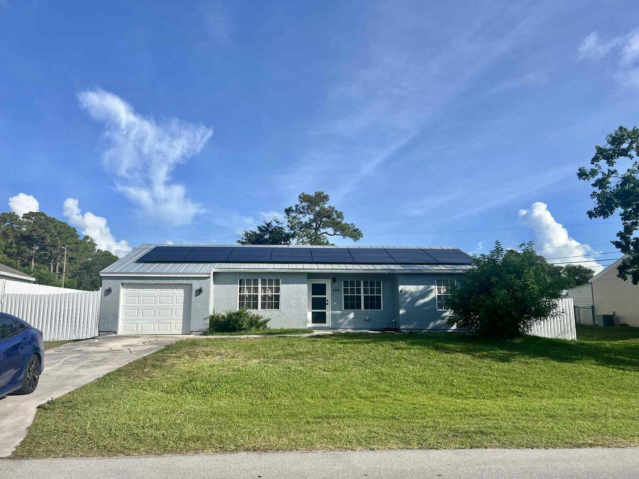 Welcome to 2216 SE Newcastle Ter in Port St. Lucie! This beautifully upgraded 3BD/2BA single-family home with no HOA, is located in a family-friendly neighborhood and includes Electricity, Water, and Wi-Fi! Features include solar panels, an updated kitchen with stainless steel appliances, new flooring, impact windows, and remodeled bathrooms. Enjoy a fully fenced backyard with an above-ground pool--tenants to maintain, supplies provided and a storage shed. A washer/dryer will be provided. The home also has a water softener system--tenants to maintain. Pets are welcome! Don't miss this move-in ready gem offering unbeatable value!